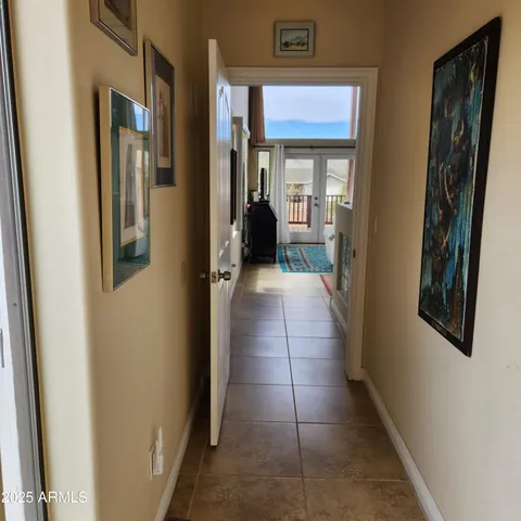 a hallway with a bathroom