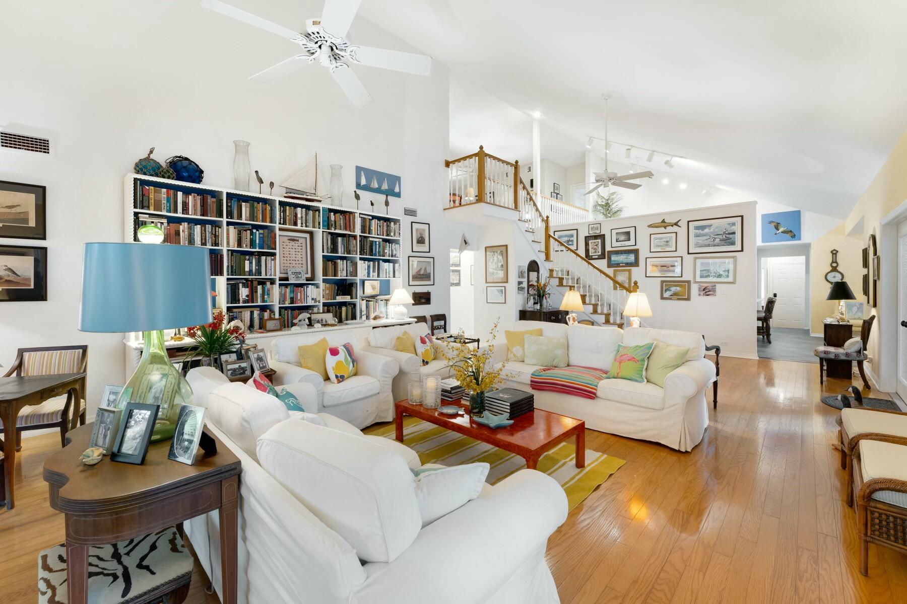 33 Pen Key Drive Islamorada, FL 33036 - Photo 14 of 60 a living room with furniture and a book shelf
