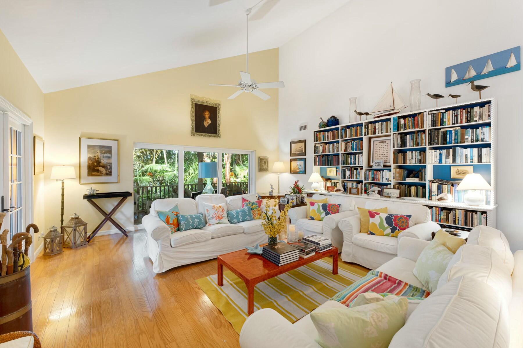 33 Pen Key Drive Islamorada, FL 33036 - Photo 15 of 60 a living room with furniture and a book shelf