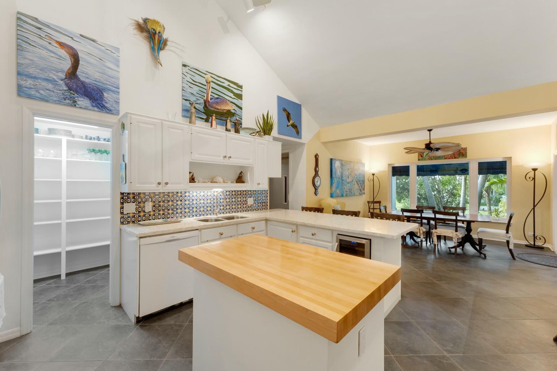 33 Pen Key Drive Islamorada, FL 33036 - Photo 22 of 60 a kitchen with a stove a sink and a refrigerator