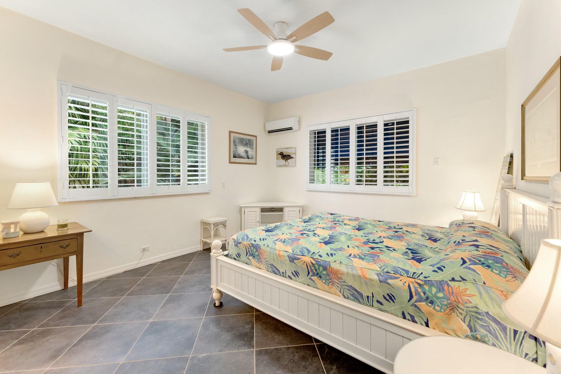 33 Pen Key Drive Islamorada, FL 33036 - Photo 26 of 60 a bed sitting in a bedroom next to a window
