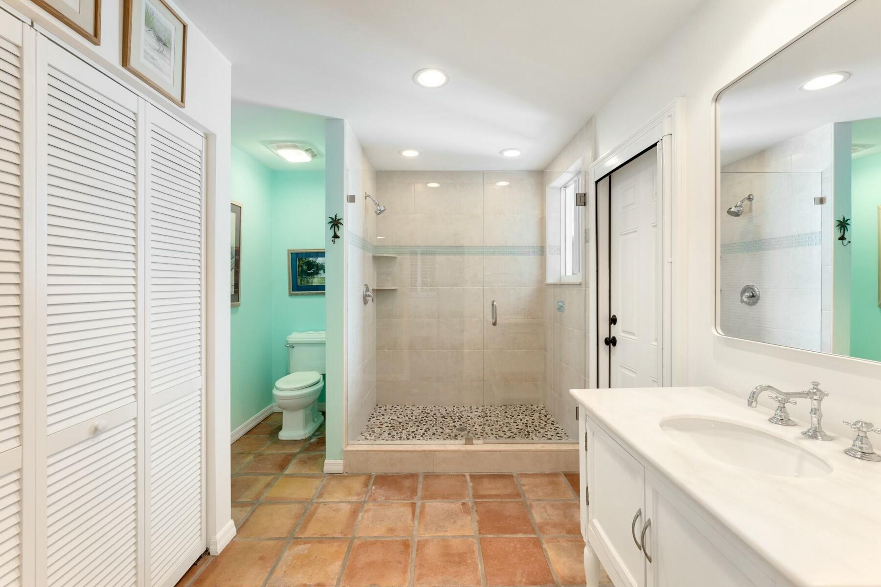 33 Pen Key Drive Islamorada, FL 33036 - Photo 28 of 60 a bathroom with a granite countertop sink a toilet and shower