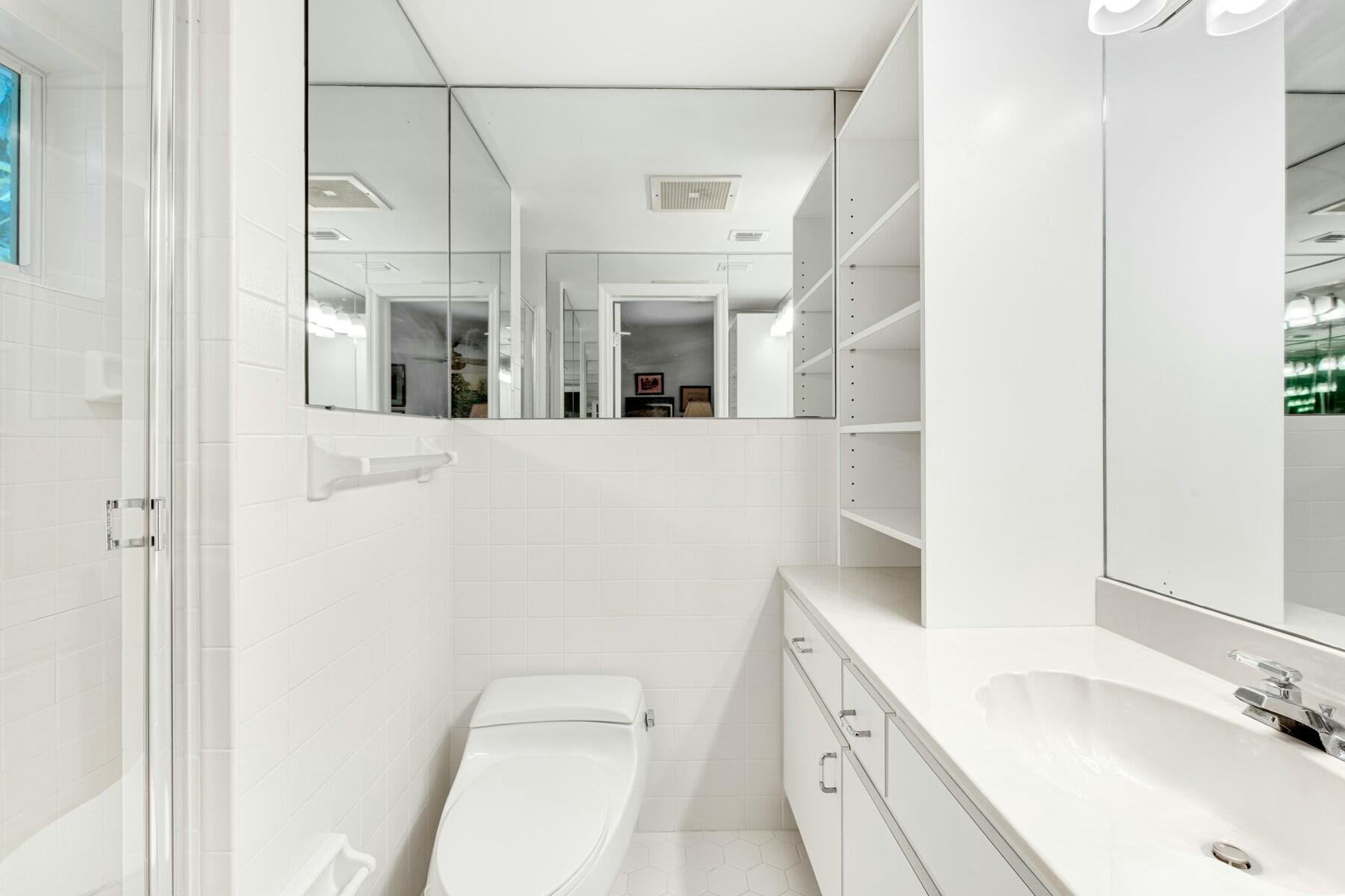 33 Pen Key Drive Islamorada, FL 33036 - Photo 45 of 60 a bathroom with a sink a toilet and shower