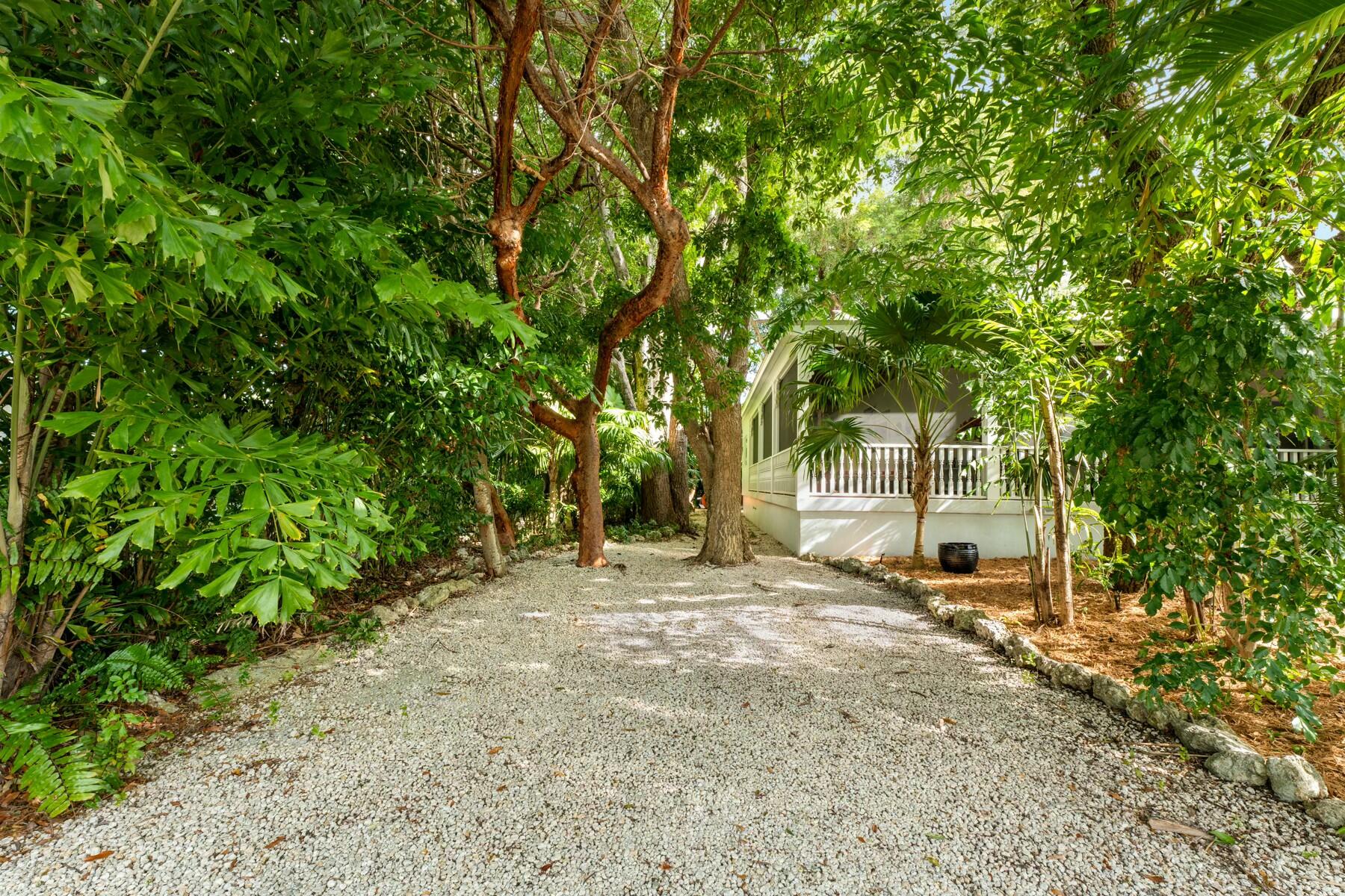 33 Pen Key Drive Islamorada, FL 33036 - Photo 8 of 60 a view of a field with trees in the background