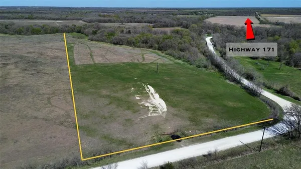 a view of a room with a floor to ceiling window