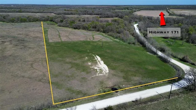 a view of a room with a floor to ceiling window