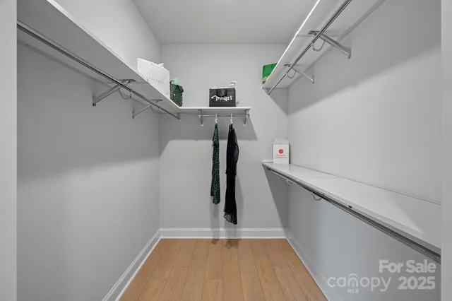 a view of a hallway with stairs