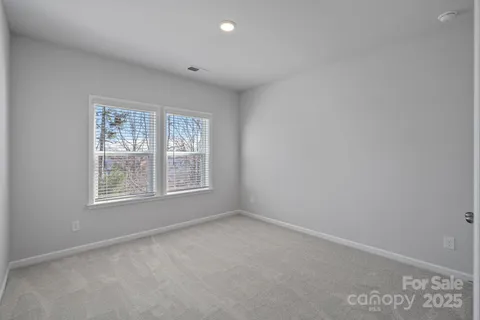 a view of a building with sitting area