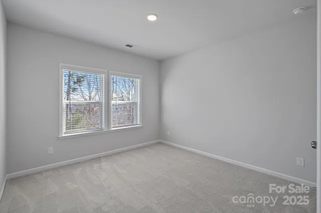 a view of a building with sitting area