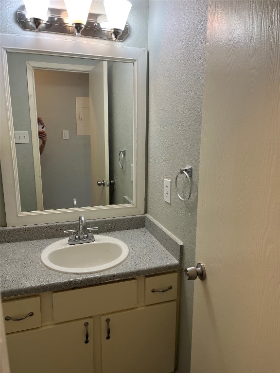 9502 Kempler Drive, Unit B Austin, TX 78748 - Photo 14 of 18 Bathroom featuring vanity