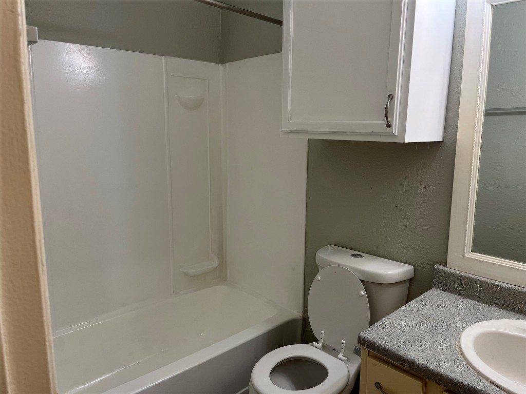 9502 Kempler Drive, Unit B Austin, TX 78748 - Photo 15 of 18 Full bath with vanity and bathtub / shower combination