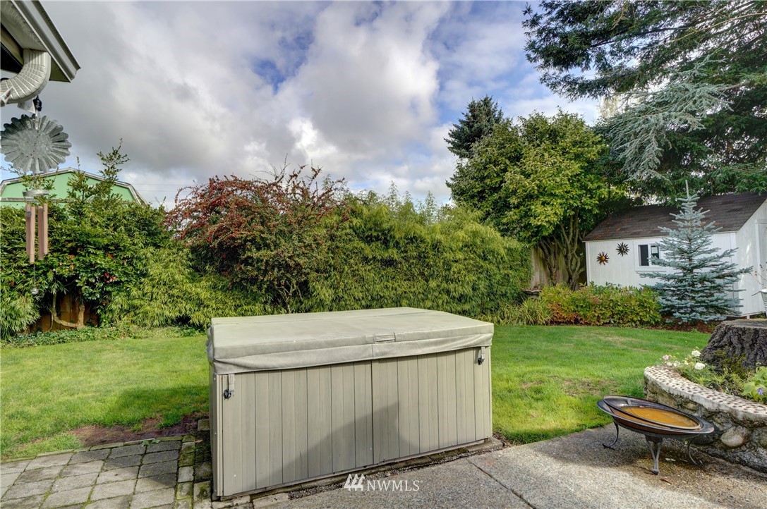 16116 119th Avenue Southeast Renton, WA 98058 - Photo 19 of 20 a backyard of a house with yard and trampoline