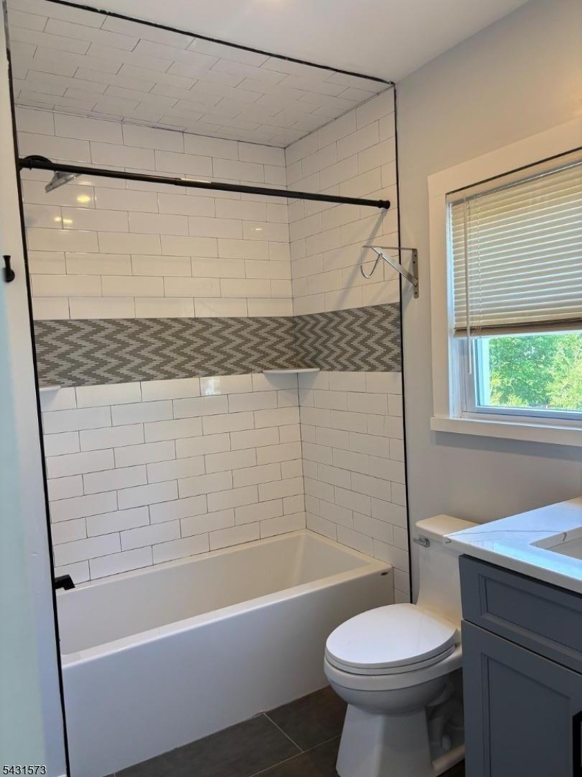 358 Woodland Road, Unit 2 Madison, NJ 07940 - Photo 16 of 50 a bathroom with a sink a toilet and a bathtub