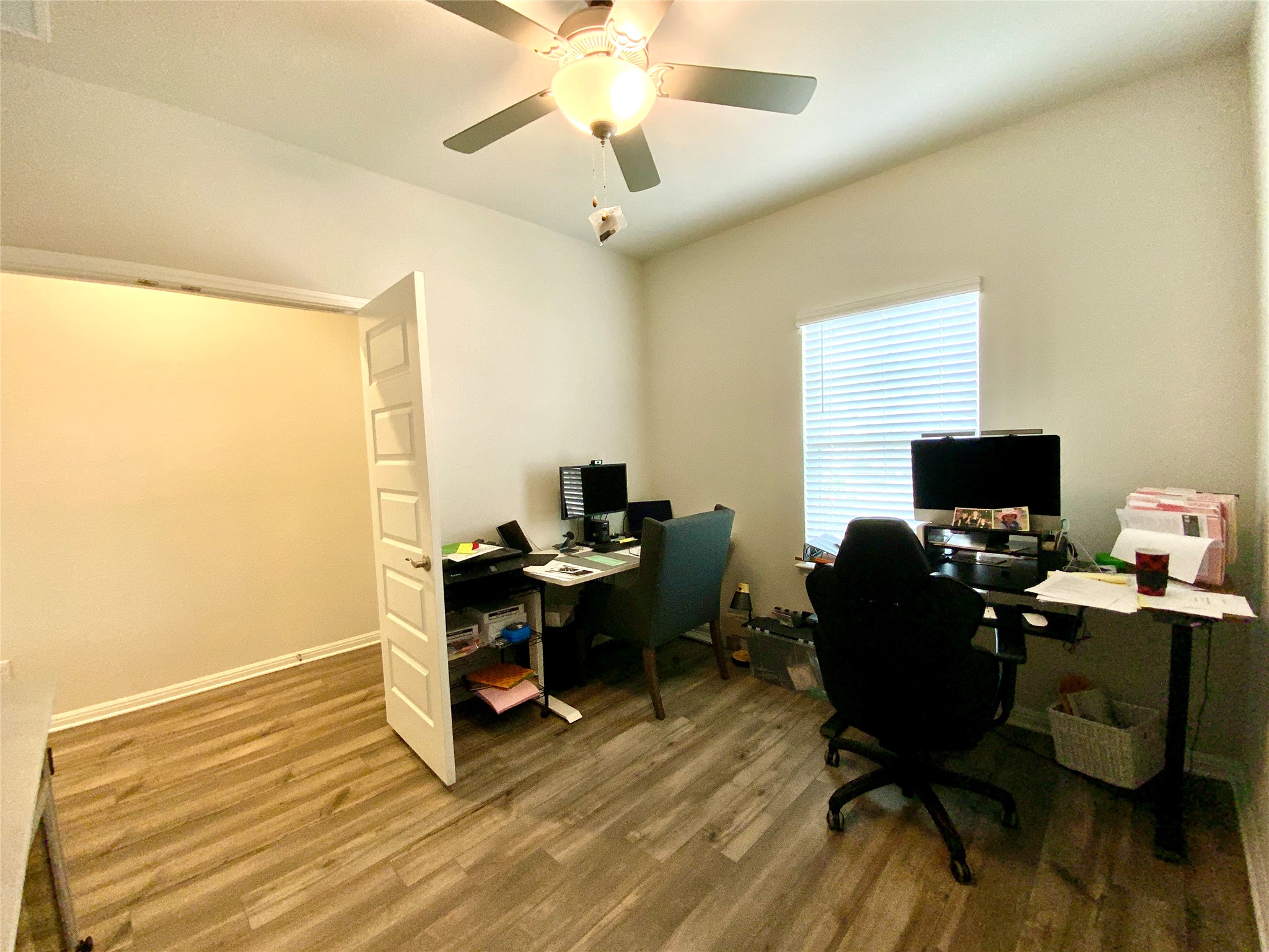 246 El Capitan Loop Dripping Springs, TX 78620 - Photo 7 of 37 Office space with wood finished floors and ceiling fan