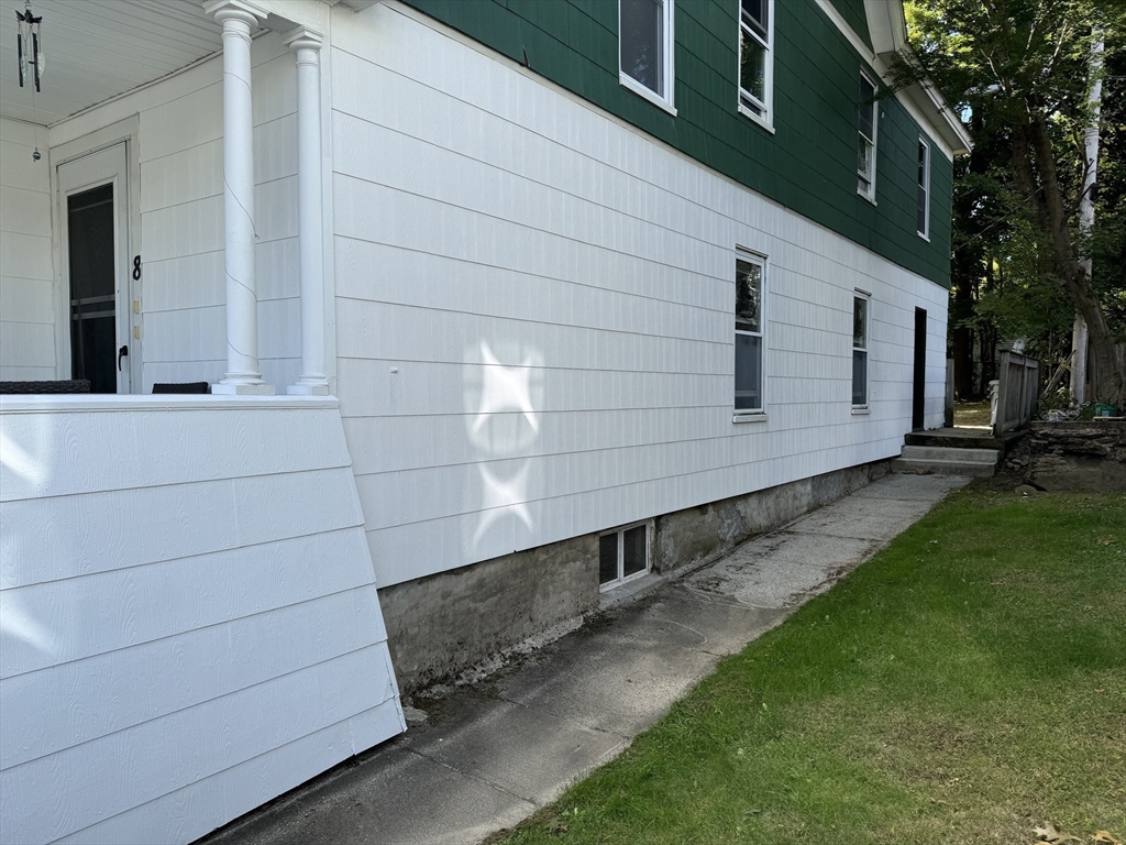 8 Eureka Street Worcester, MA 01603 - Photo 22 of 25 a view of a back yard of the house
