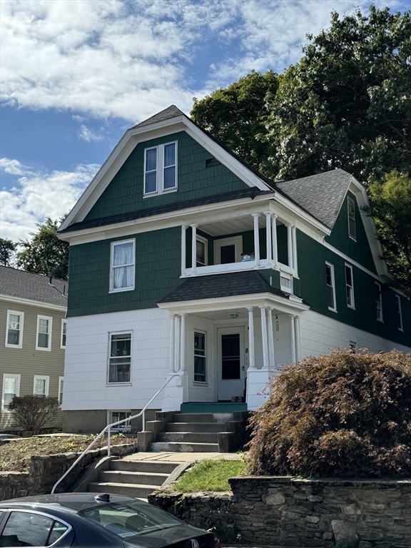 8 Eureka Street Worcester, MA 01603 - Photo 23 of 25 a front view of a house with a garden
