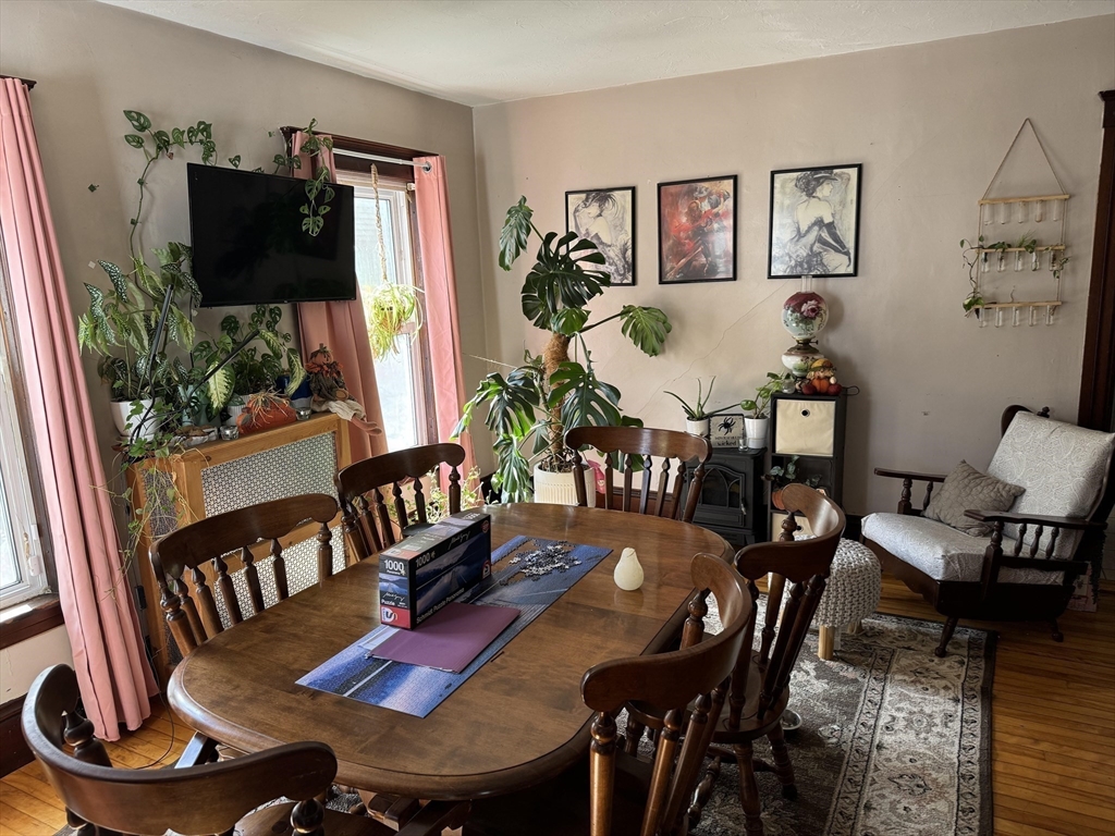 8 Eureka Street Worcester, MA 01603 - Photo 4 of 25 a view of a dining room with furniture and wooden floor