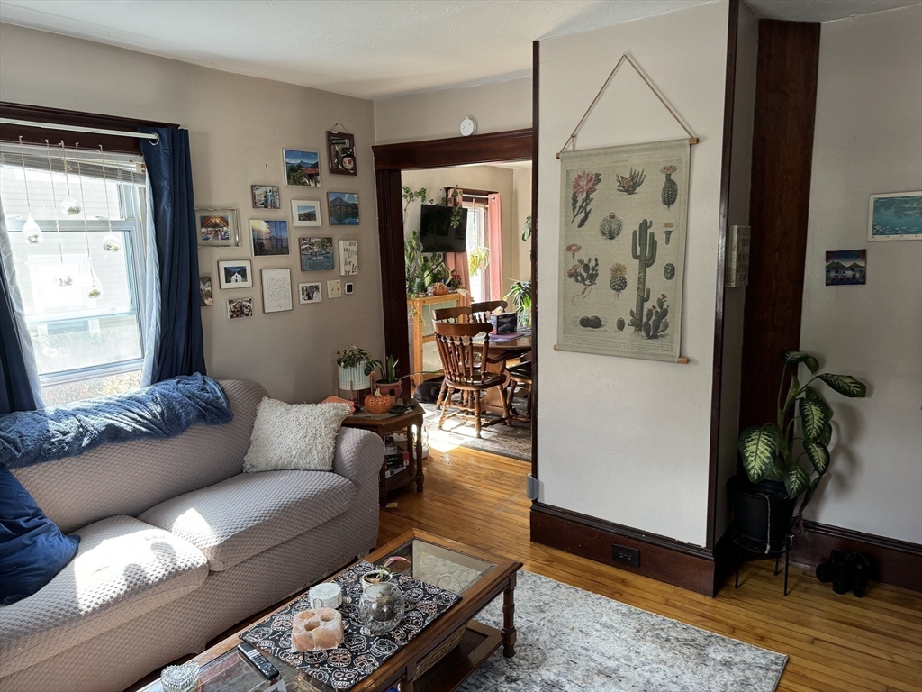 8 Eureka Street Worcester, MA 01603 - Photo 7 of 25 a living room with furniture and wooden floor