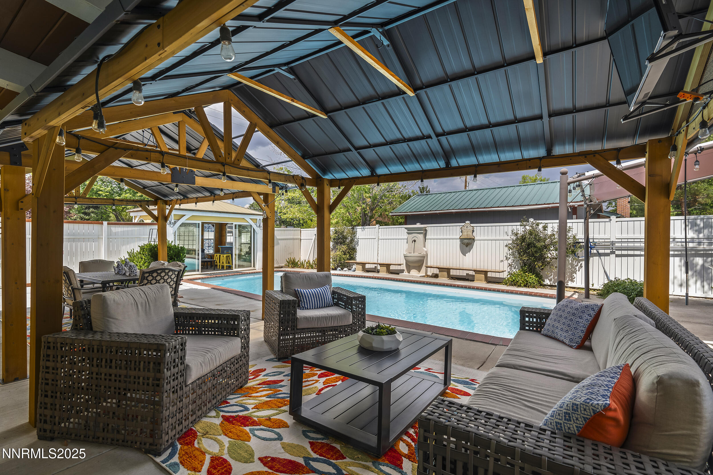 2195 West Plumb Lane Reno, NV 89509 - Photo 27 of 27 a outdoor living space with patio furniture and a potted plant