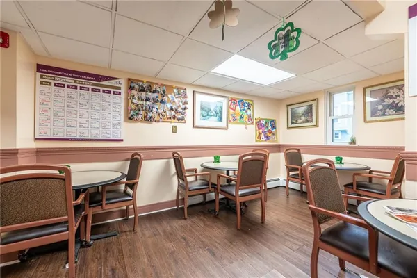 a room with furniture and wooden floor