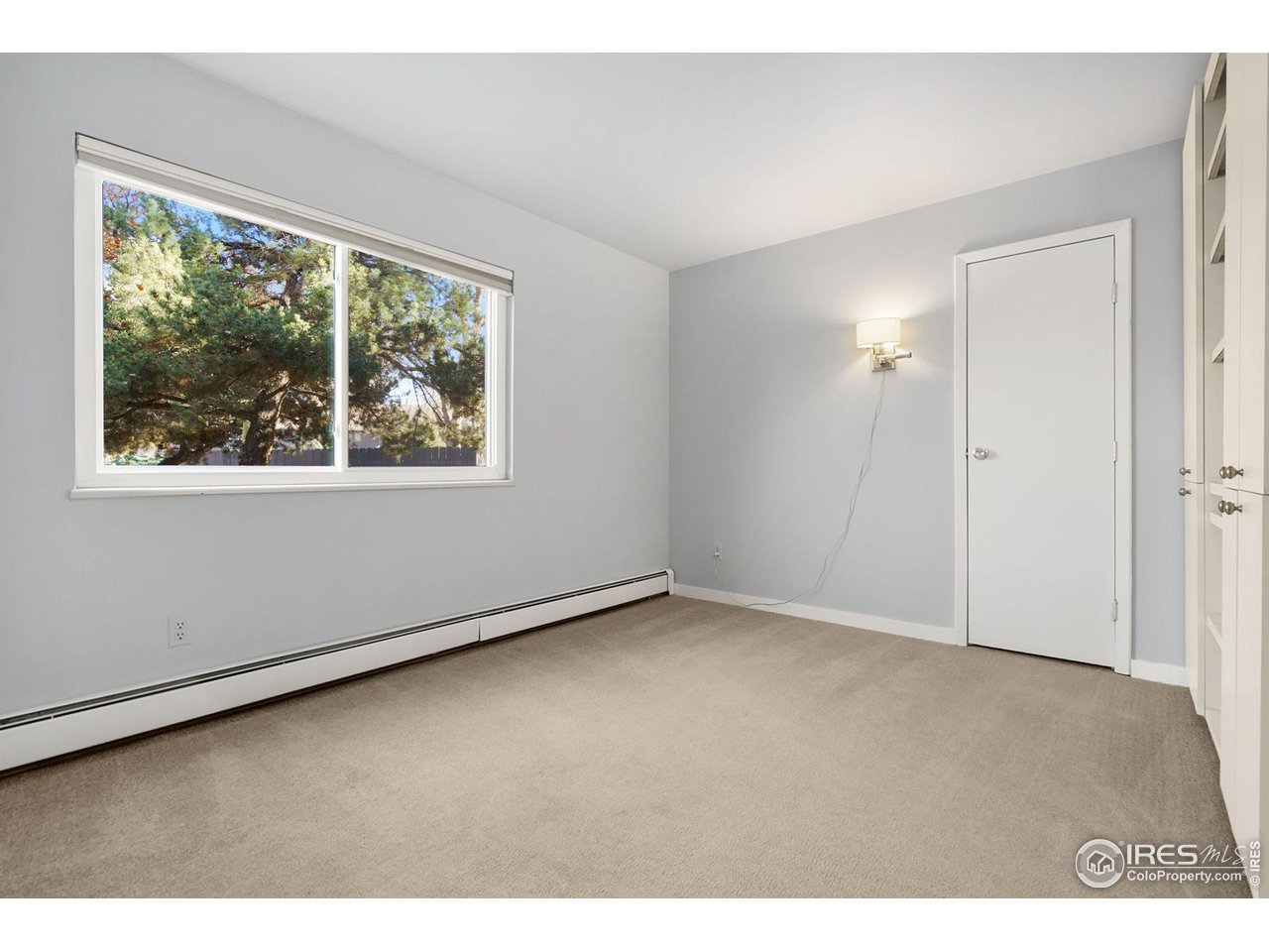 801 East Drake Road, Unit 61 Fort Collins, CO 80525 - Photo 11 of 23 a view of an empty room with a window