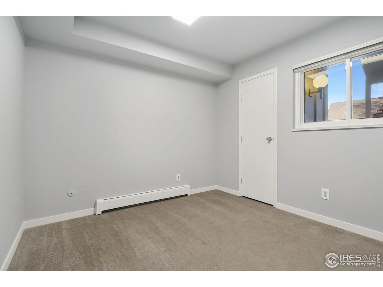 801 East Drake Road, Unit 61 Fort Collins, CO 80525 - Photo 14 of 23 a view of an empty room with a window