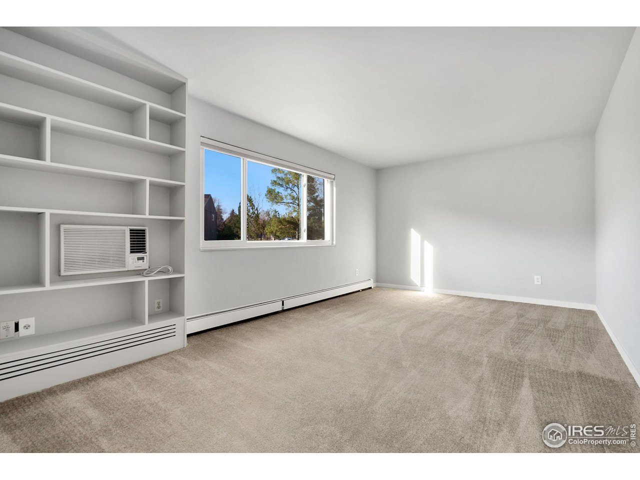 801 East Drake Road, Unit 61 Fort Collins, CO 80525 - Photo 3 of 23 a view of an empty room with a window