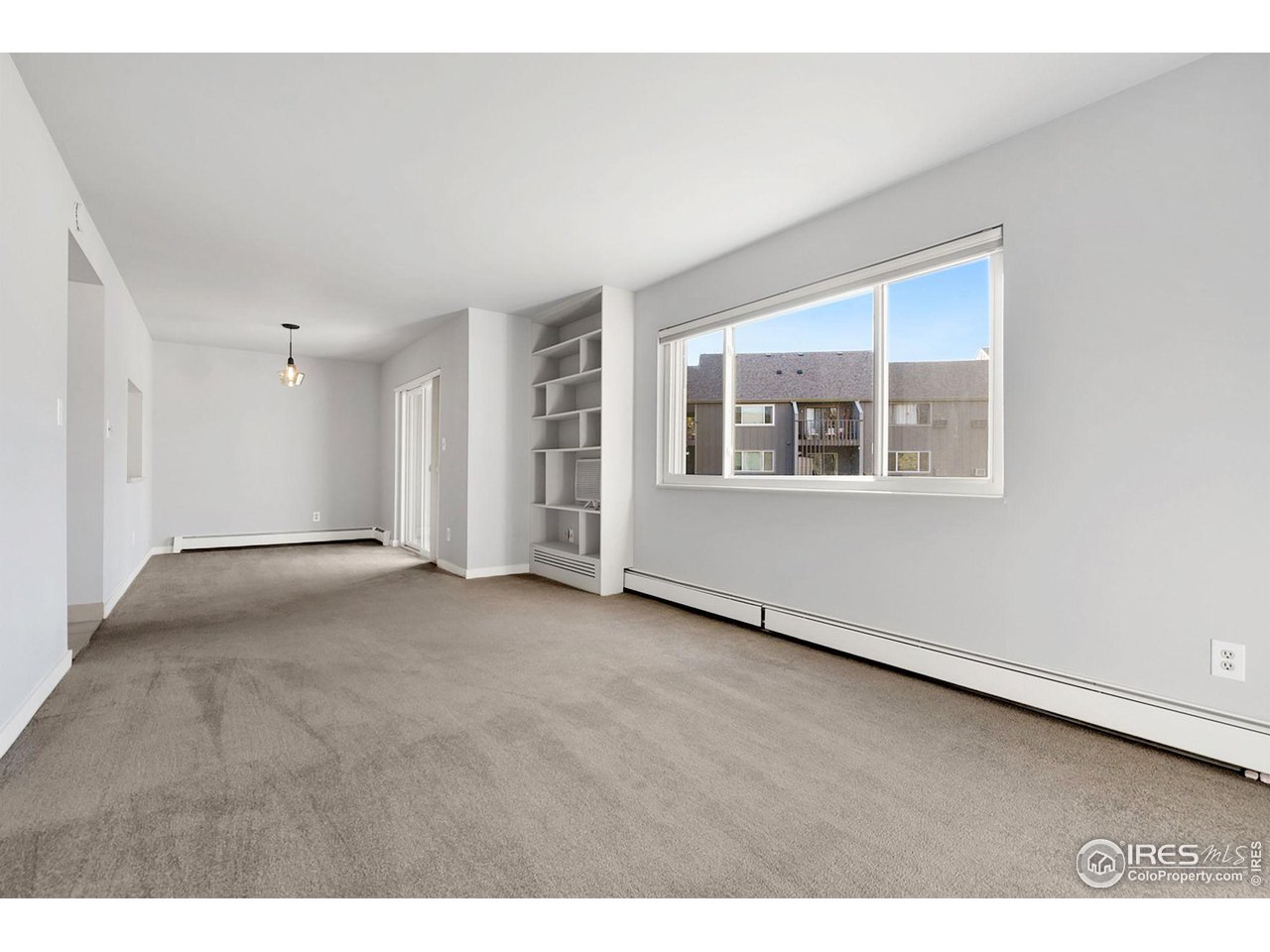801 East Drake Road, Unit 61 Fort Collins, CO 80525 - Photo 4 of 23 a view of an empty room with a window