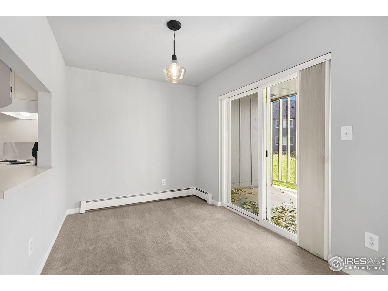 801 East Drake Road, Unit 61 Fort Collins, CO 80525 - Photo 5 of 23 a view of an empty room with a window