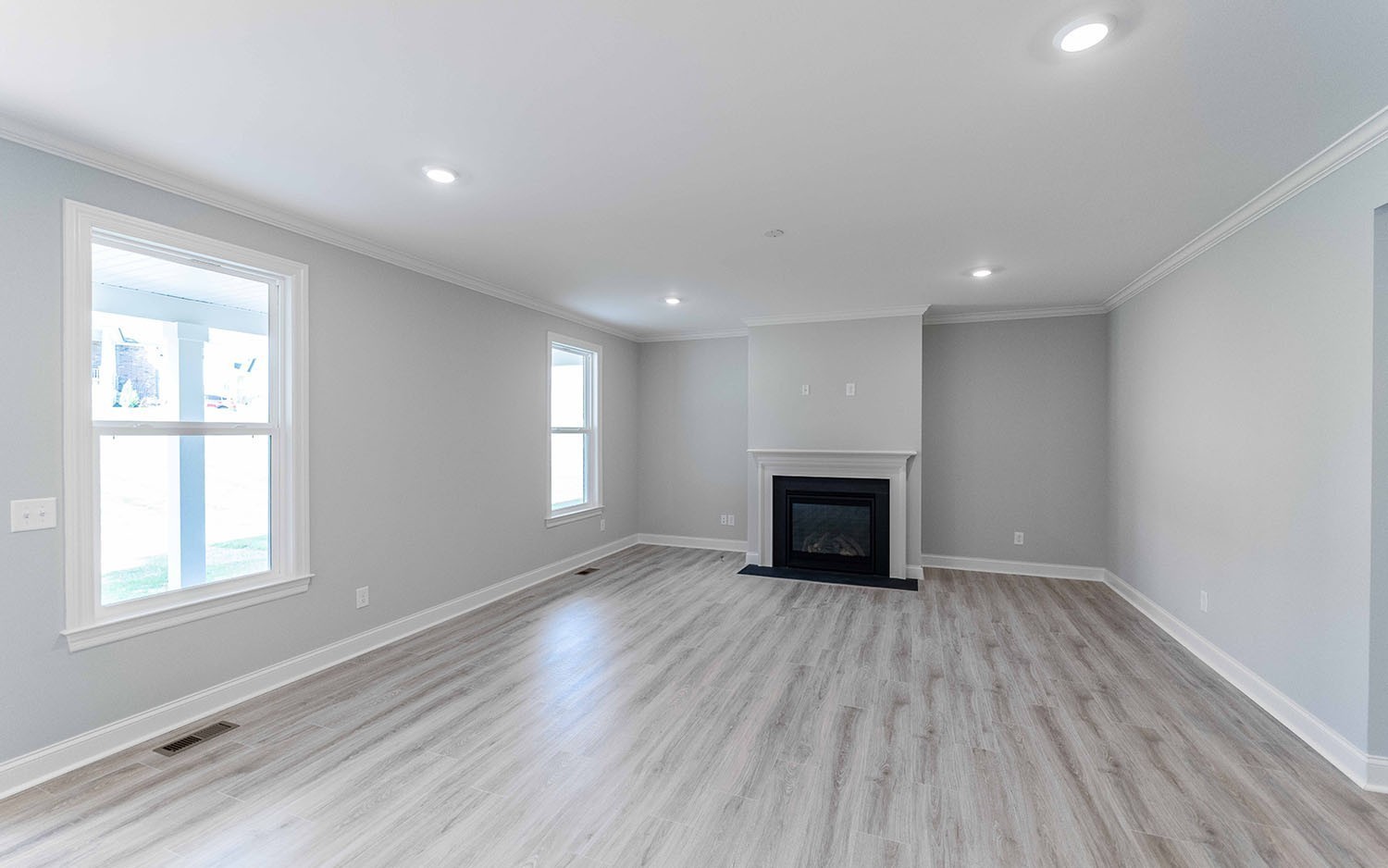7910 Pine Street Fairview, TN 37062 - Photo 14 of 32 wooden floor in an empty room with a window