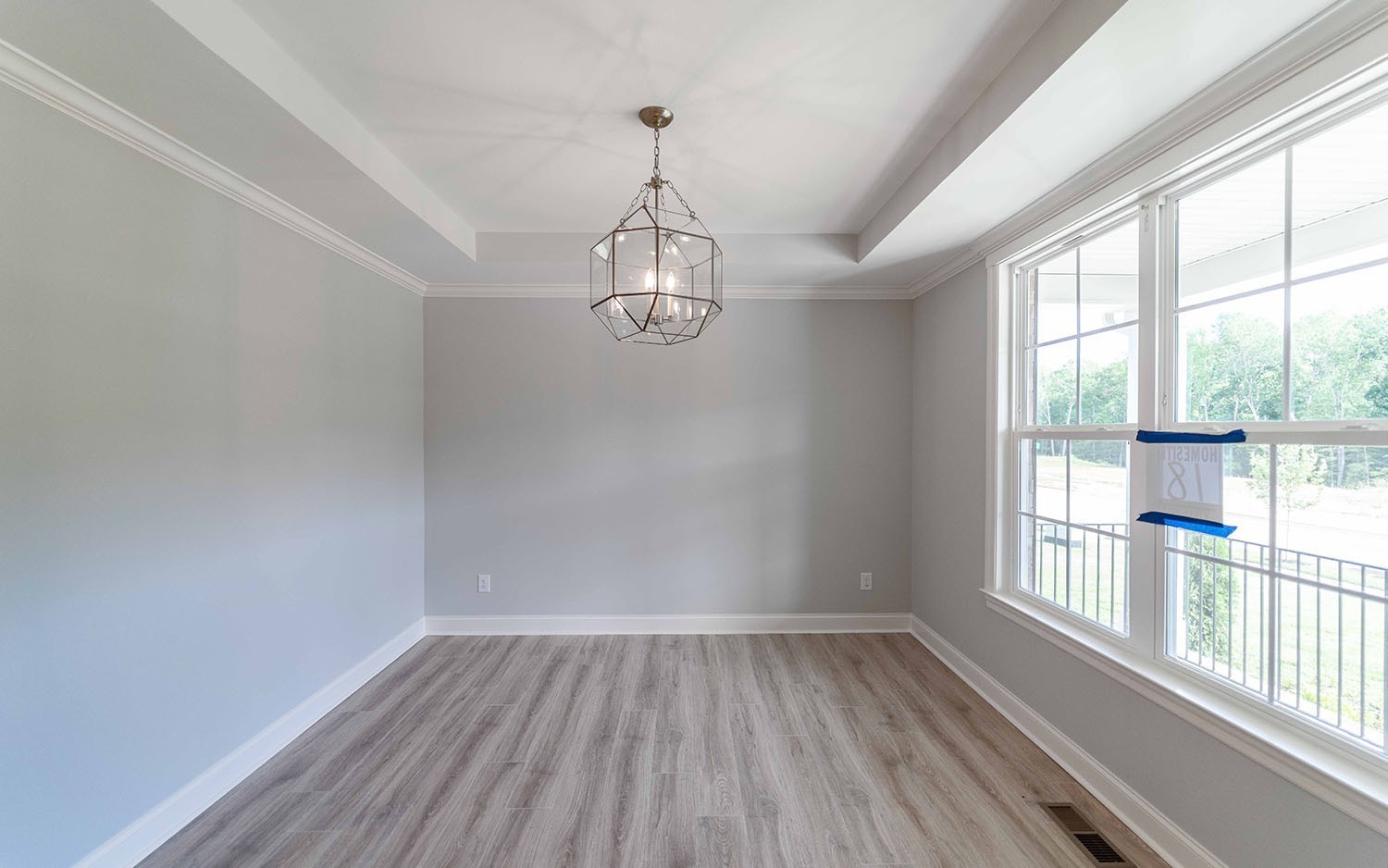 7910 Pine Street Fairview, TN 37062 - Photo 19 of 32 a view of a room with wooden floor and windows