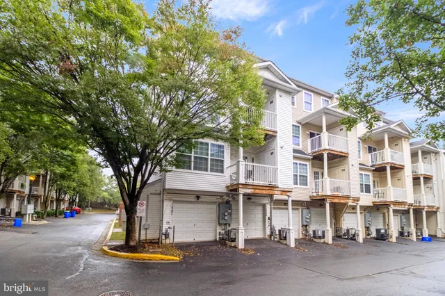a view of a building with a tree