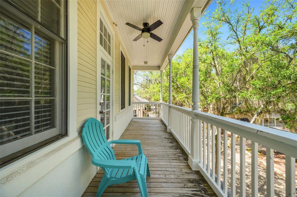 5213 Southwest 91 Terrace, Unit B Gainesville, FL 32608 - Photo 23 of 38 a view of a porch with furniture