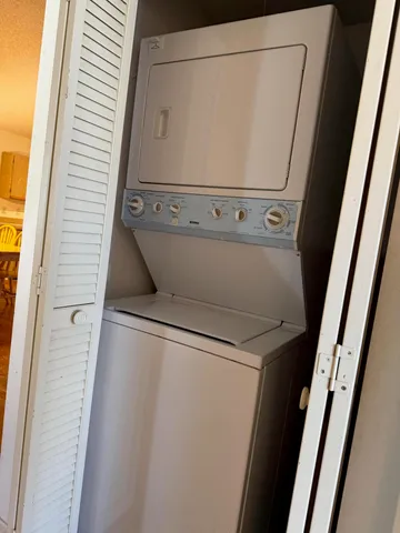 a bathroom with a toilet a sink and bathtub