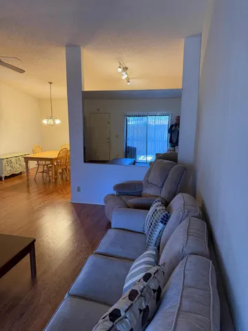 a living room with furniture and a couch