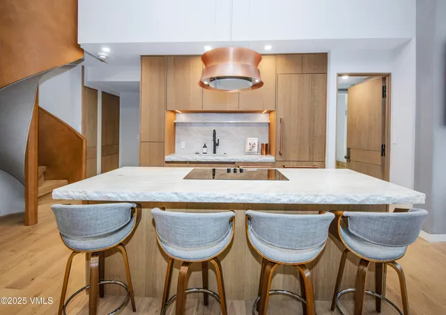 a view of a dining room with furniture and window