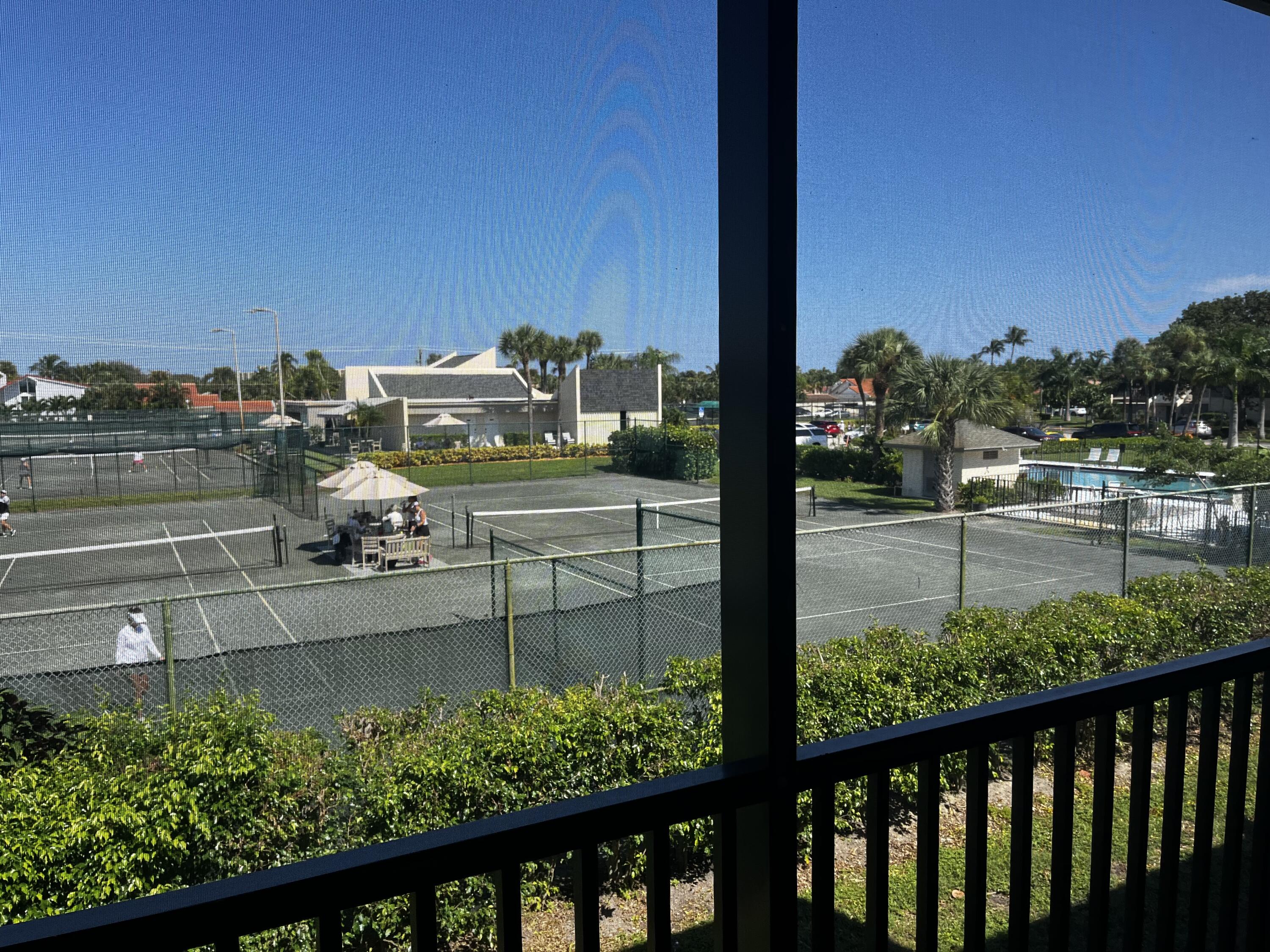 1605 Highway 1, Unit 203 V4 Jupiter, FL 33477 - Photo 19 of 33 a view of a balcony with wooden floor