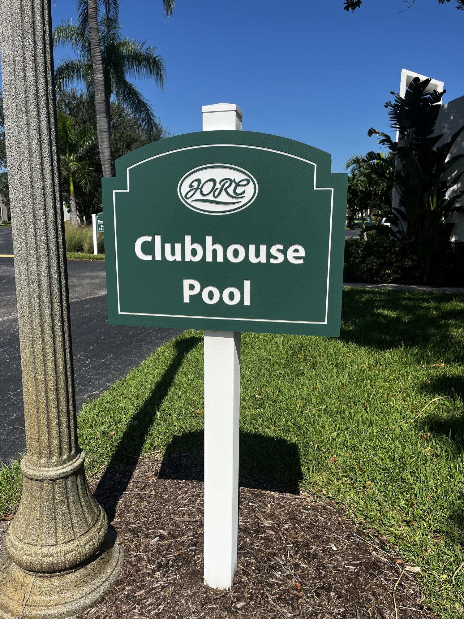 1605 Highway 1, Unit 203 V4 Jupiter, FL 33477 - Photo 24 of 33 a sign on the side of the building