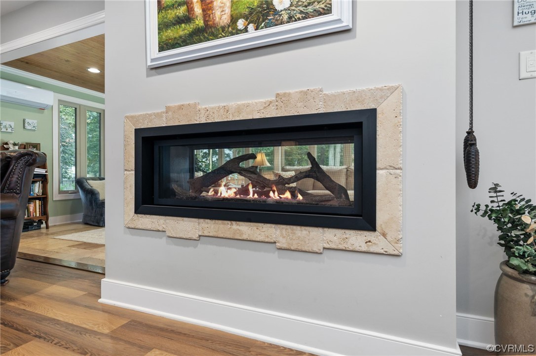 2730 West Brigstock Road Midlothian, VA 23113 - Photo 11 of 49 a living room with a fireplace