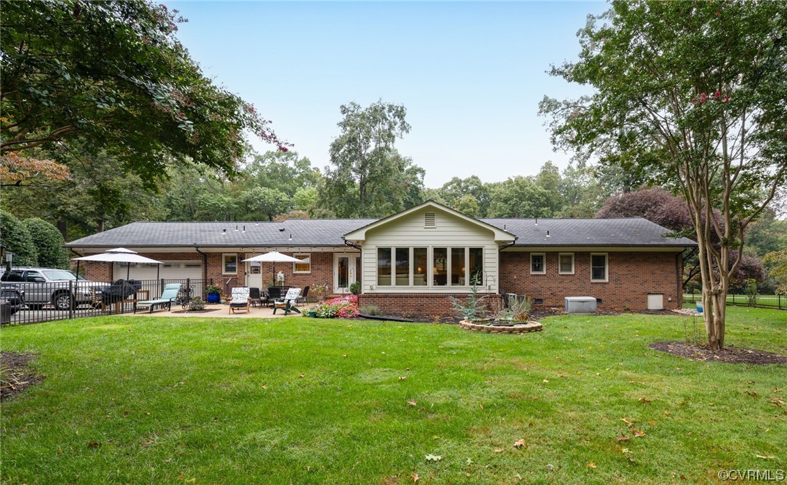 2730 West Brigstock Road Midlothian, VA 23113 - Photo 33 of 49 a front view of a house with garden