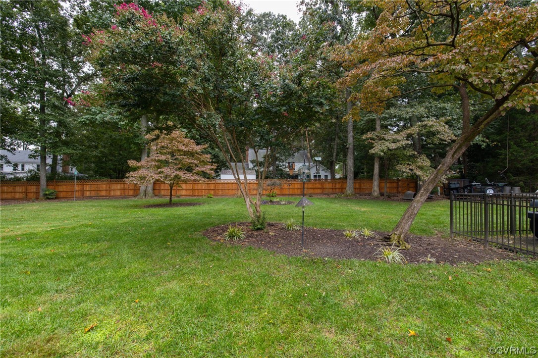 2730 West Brigstock Road Midlothian, VA 23113 - Photo 38 of 49 a view of a park with large trees