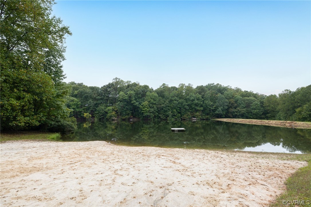 2730 West Brigstock Road Midlothian, VA 23113 - Photo 41 of 49 a view of a lake beach and mountain
