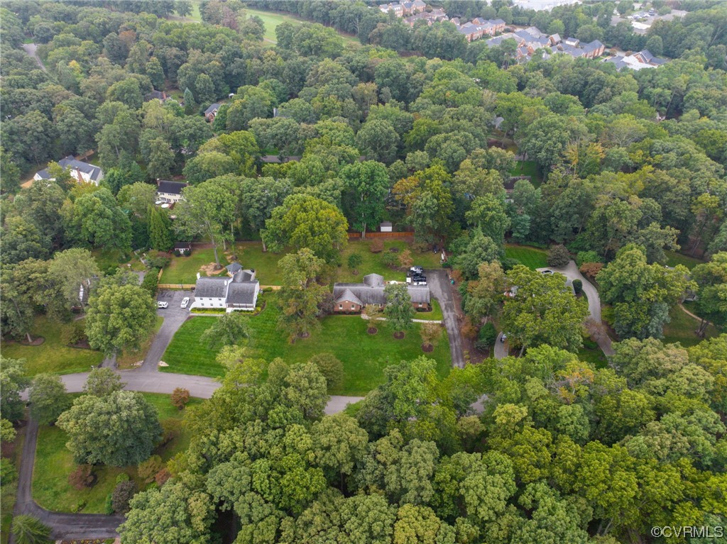 2730 West Brigstock Road Midlothian, VA 23113 - Photo 46 of 49 an aerial view of residential houses with outdoor space and trees
