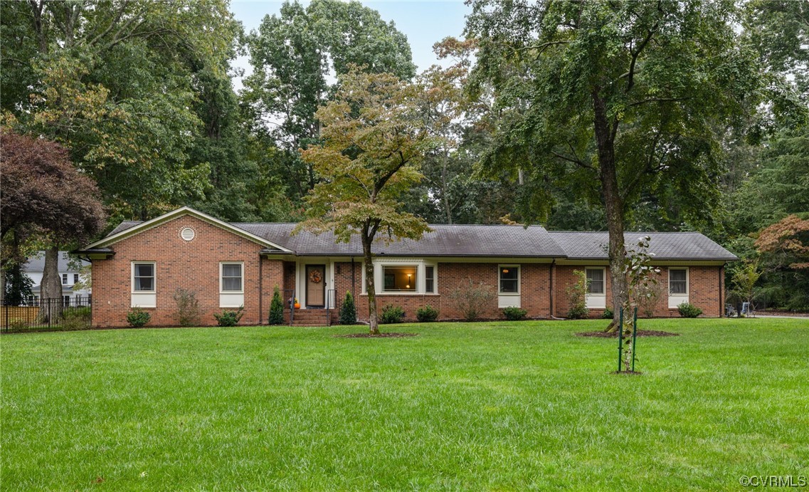 2730 West Brigstock Road Midlothian, VA 23113 - Photo 49 of 49 a front view of house with yard and green space