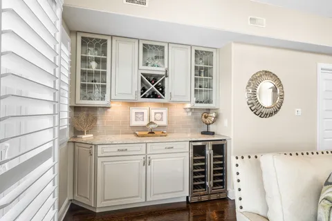a view of cabinets and wooden floor