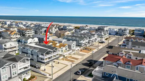 an aerial view of a building with outdoor space
