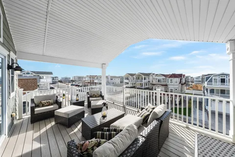 a view of a terrace with furniture