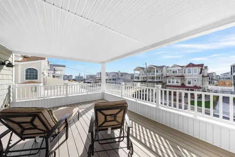 a view of a chairs and table on the terrace