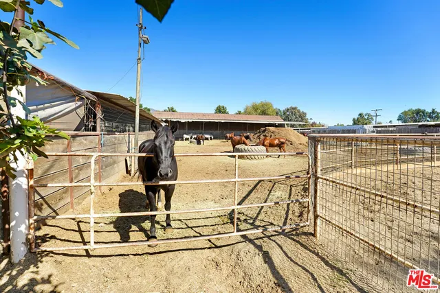 a view of a balcony with chairs
