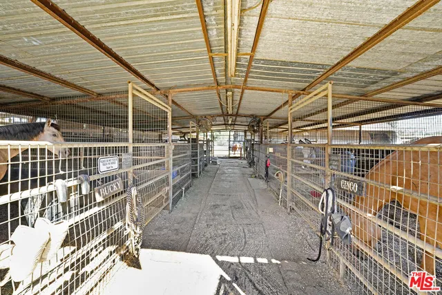 a view of car parked on the side of the road